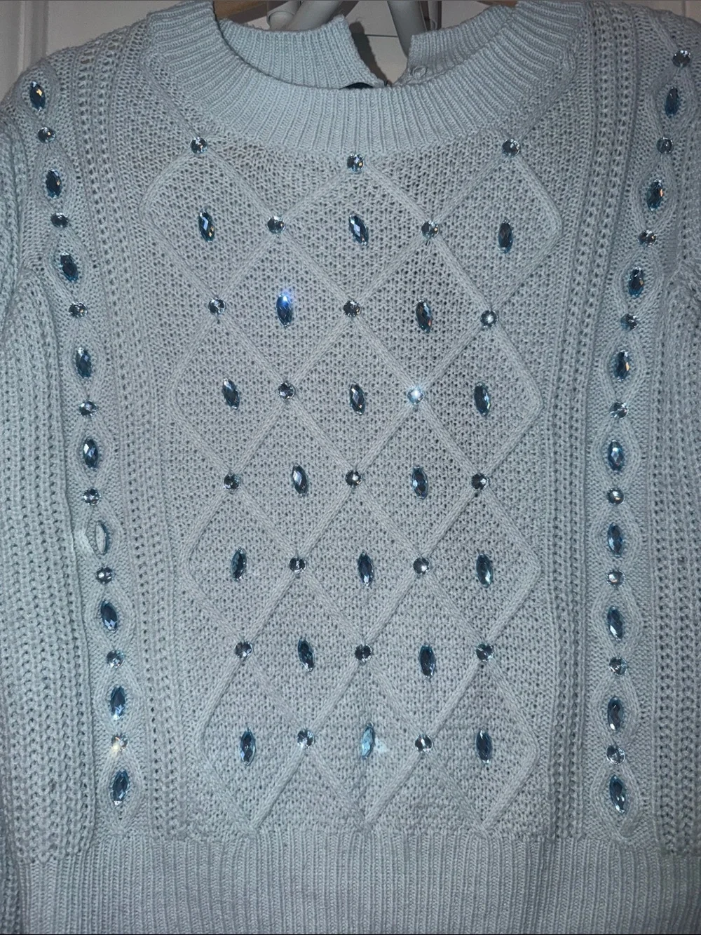 Elegant Light Blue Knit Sweater with Embellishments